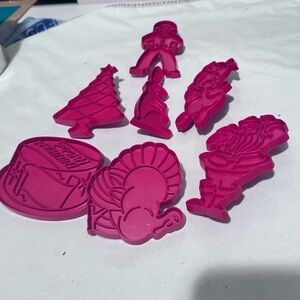 Vintage red Tupperware cookie cutters in great shape. Collectible